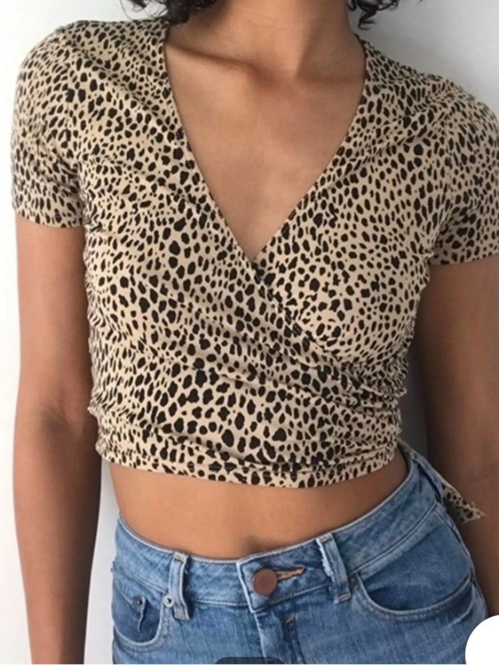 Brandy Melville cropped wrap around short sleeve cheetah print top size small